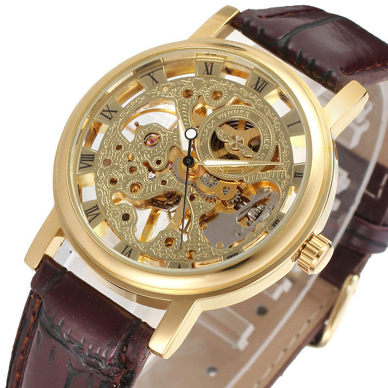 Gold mechanical watch with a brown leather strap on a white background