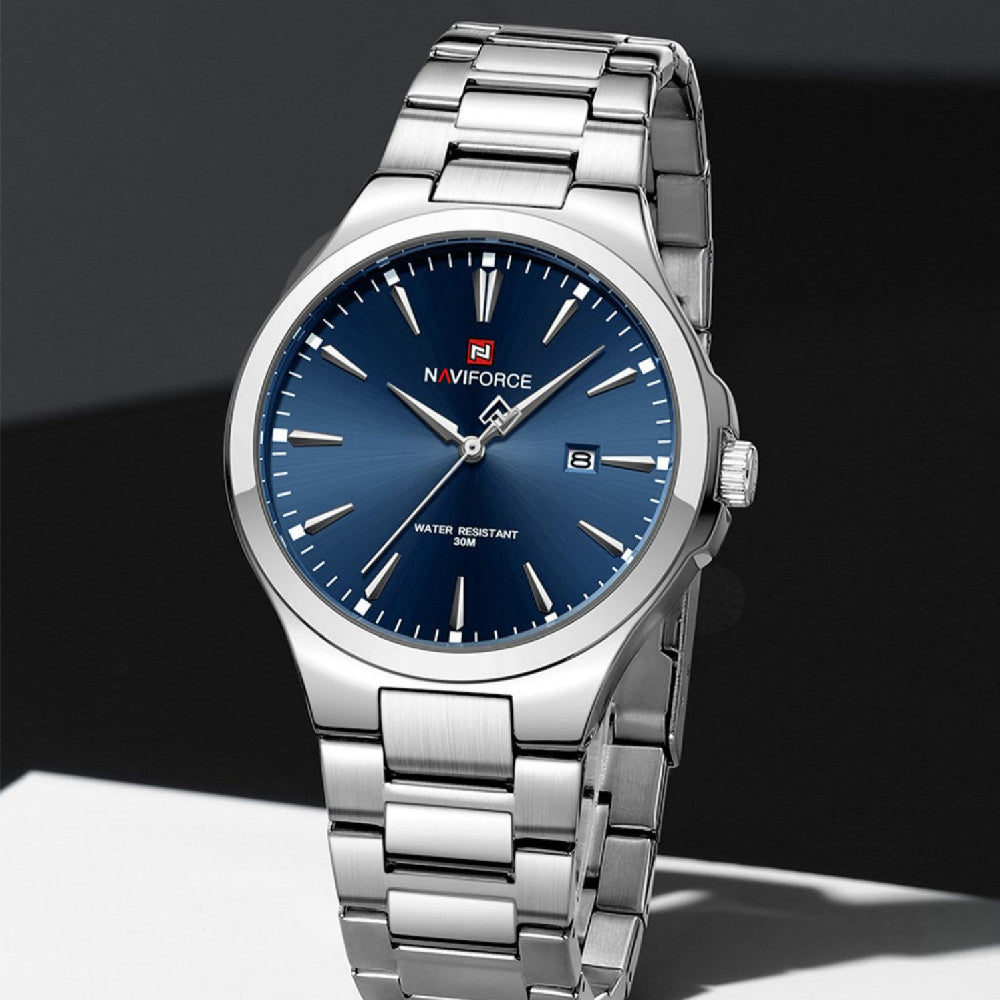 Silver wristwatch with blue dial on a dark background
